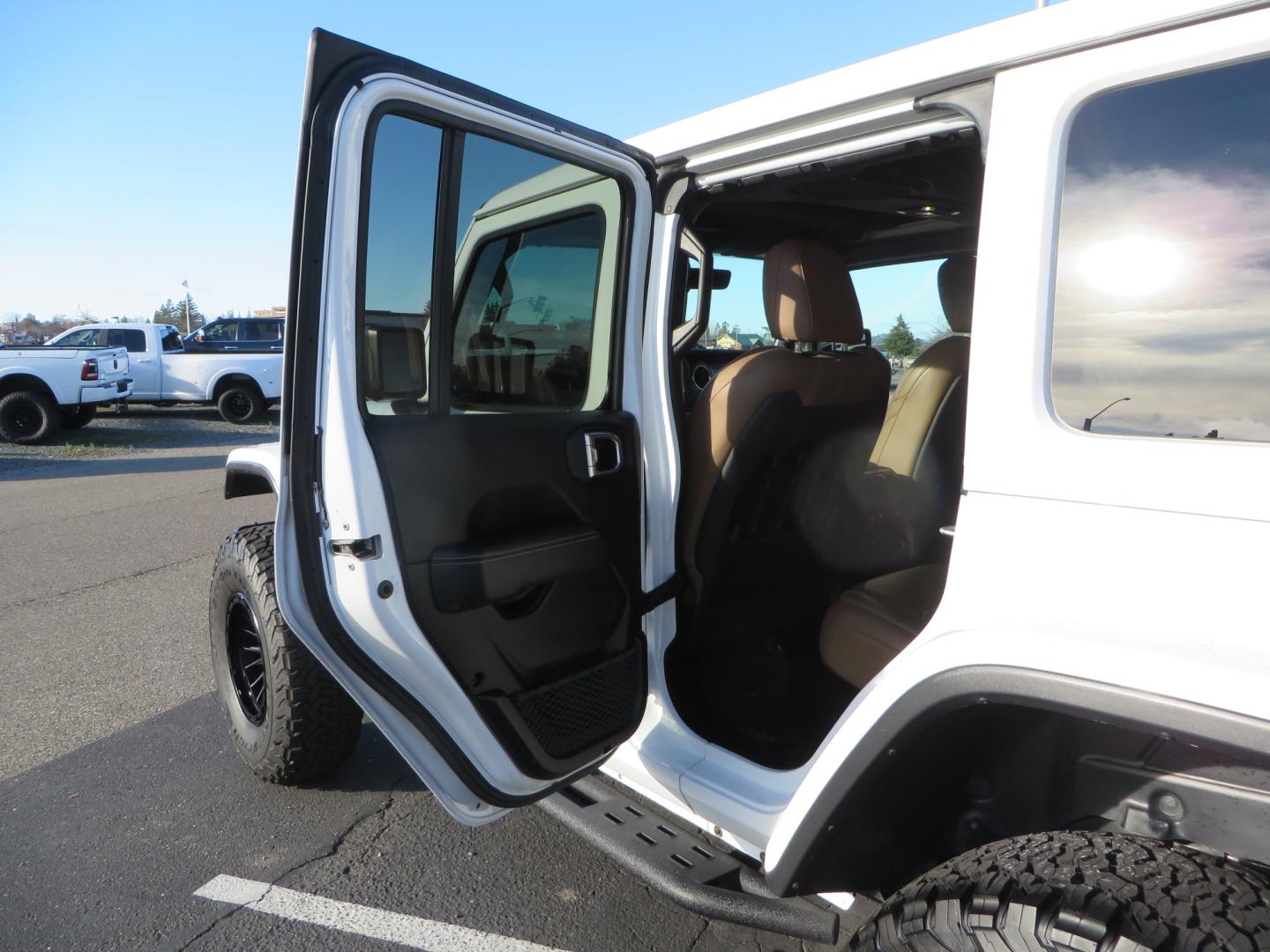 2020 White /TAN Jeep Wrangler Unlimited Rubicon (1C4HJXFG8LW) with an 3.6L V6 DOHC 24V FFV engine, 6A transmission, located at 2630 Grass Valley Highway, Auburn, CA, 95603, (530) 508-5100, 38.937893, -121.095482 - 3" Zone offroad suspension system, Fox adventure series shocks, rocksliders, Teraflex HD tire relocation, Mopar HD tailgate hinge, 17" KMC wheels, and 37" BFG KO2 tires. - Photo#37